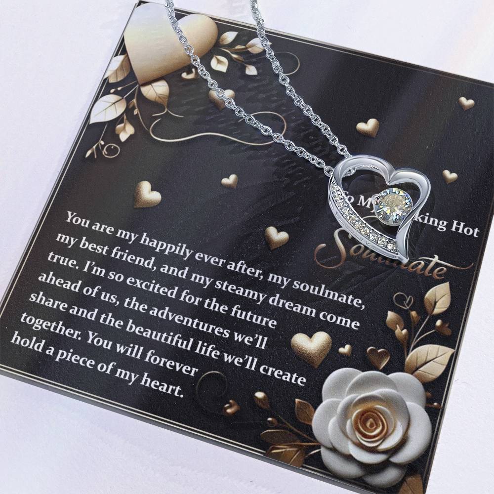 The Soulmate-The Future - Forever Love Necklace showcases a heart-shaped pendant with sparkling cubic zirconia on a card featuring a romantic message, complete with an elegant gold finish and white rose design for timeless beauty.