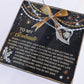 The Soulmate-By My Side - Forever Love Necklace is a heart-shaped silver piece with a diamond, presented on a black card with a heartfelt message. Decorated with gold and white festive touches, it makes the perfect personalized gift for cherished moments.