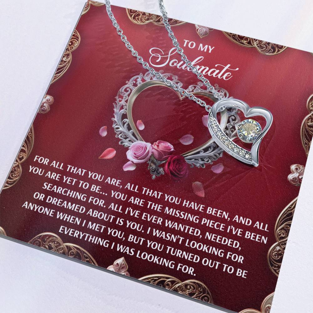 The Soulmate-I Met You - Forever Love Necklace is heart-shaped, finished in white gold, and features a 6.5mm CZ crystal. It includes a card with heartfelt text about a soulmate.