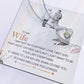 A To My Wife, I Just Want To Be Your Last Everything - Forever Love Necklace on a necklace rests on a card with a sentimental message for a spouse, featuring an illustration of a couple fishing together.