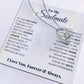 A Forever Love Necklace with a CZ crystal heart-shaped charm presented on a card with a romantic message to a soulmate by ShineOn Fulfillment.