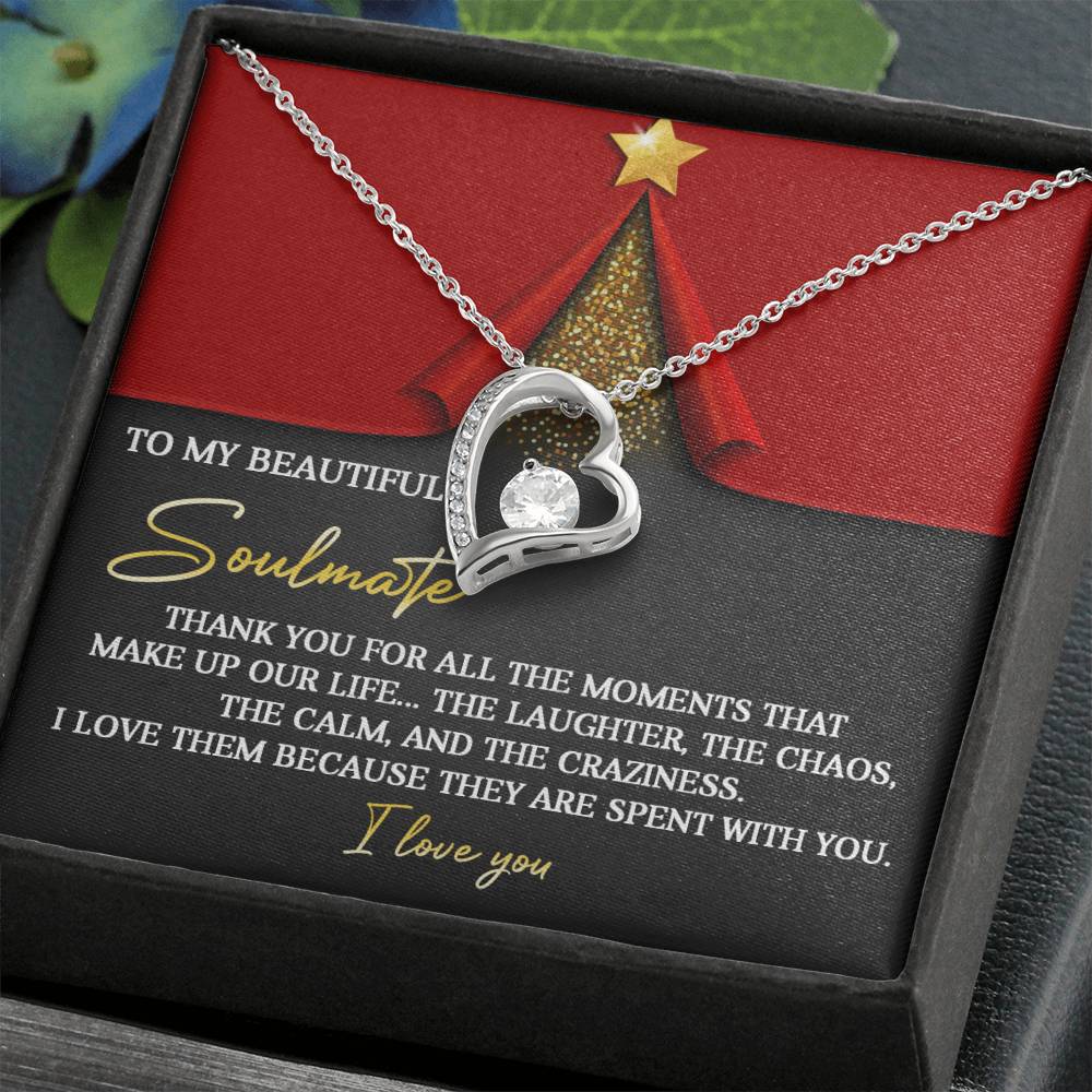 The Soulmate-The Moments - Forever Love Necklace, featuring a heart-shaped pendant embellished with shimmering CZ crystals and a striking white gold finish, is delivered in a black box complete with a heartfelt card that says: "To my beautiful soulmate. Thank you for the moments that make up our life... I love you.