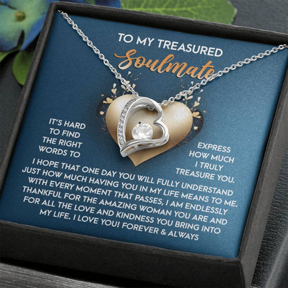 The Soulmate-In My Life - Forever Love Necklace, featuring a heart-shaped pendant with shimmering CZ crystal and white gold finish, is beautifully presented in a box with a heartfelt message expressing deep love and appreciation for a soulmate.