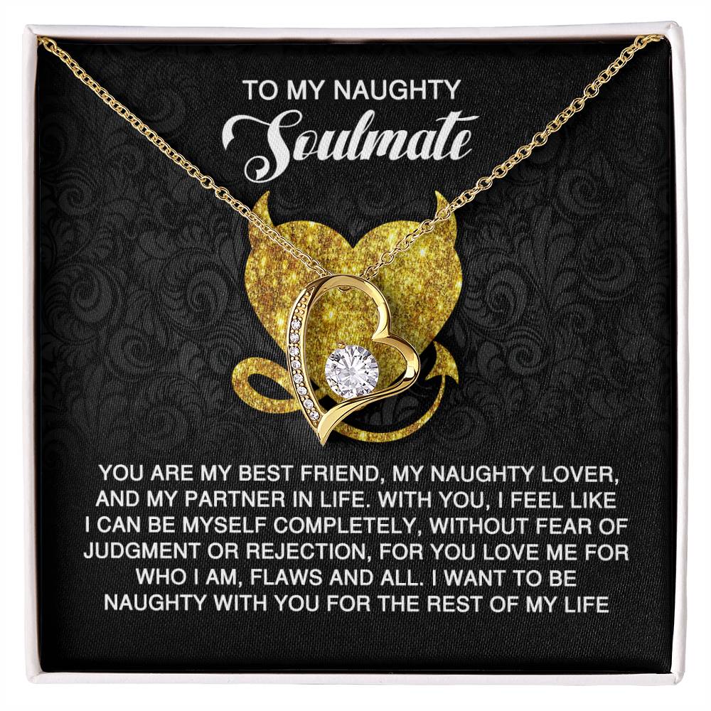 The Soulmate-Naughty With You - Forever Love Necklace features a heart pendant with a cubic zirconia stone, elegantly displayed in a box. The gold finish adds elegance, while the lid reads "To My Naughty Soulmate" with a romantic message below.