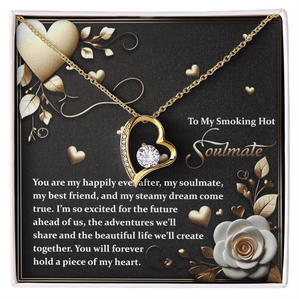 The Soulmate-The Future - Forever Love Necklace, featuring a gold finish and heart-shaped pendant with a brilliant cubic zirconia, is presented on a decorative card with hearts and roses, inscribed with a romantic message.