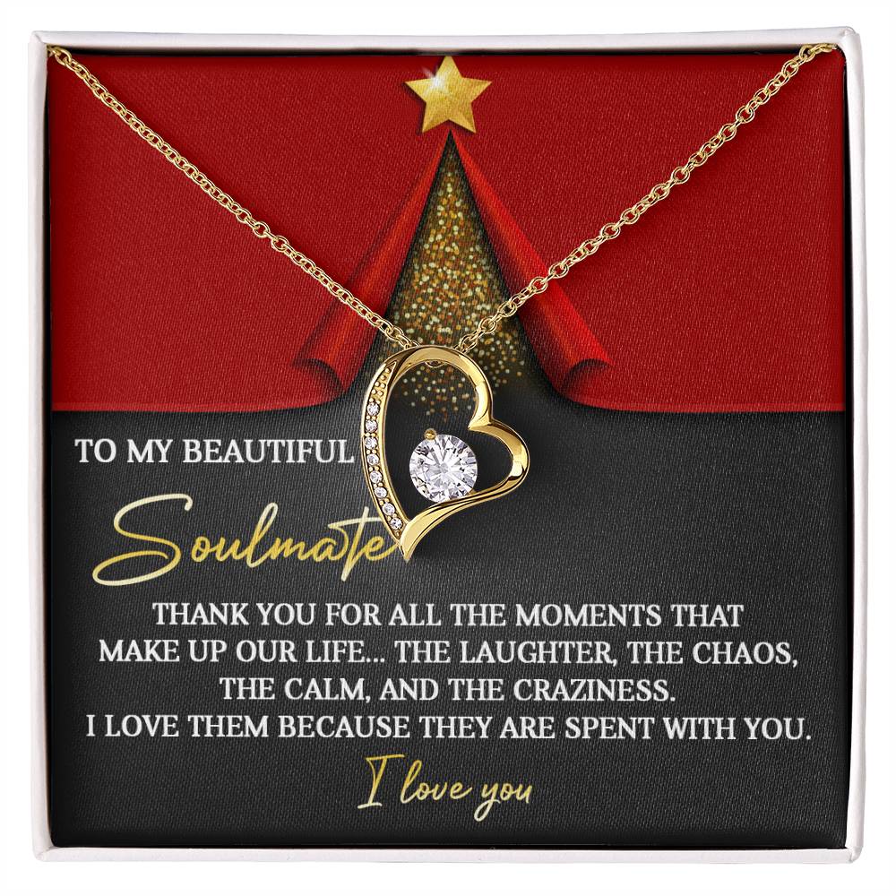 The Soulmate-The Moments - Forever Love Necklace showcases a gold heart pendant adorned with a CZ crystal, thoughtfully arranged on a card with a heartfelt message for your soulmate. Its radiant brilliance and white gold finish convey appreciation for the treasured moments you've shared together.