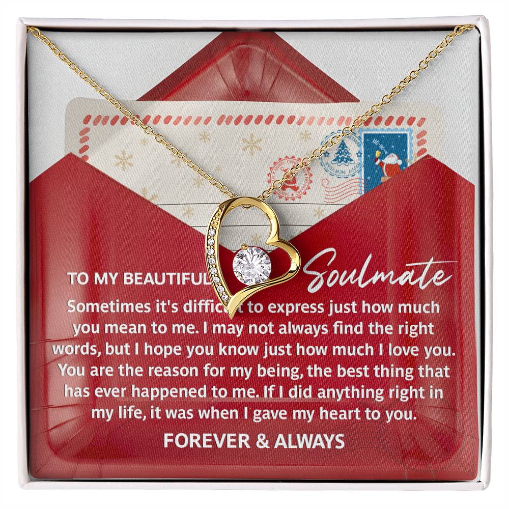 The Soulmate-Right Words - Forever Love Necklace, showcasing a stunning cubic zirconia gemstone in a gold heart-shaped design, is beautifully presented on a card within a red envelope. The card features a romantic message, making this necklace an enchanting gift.