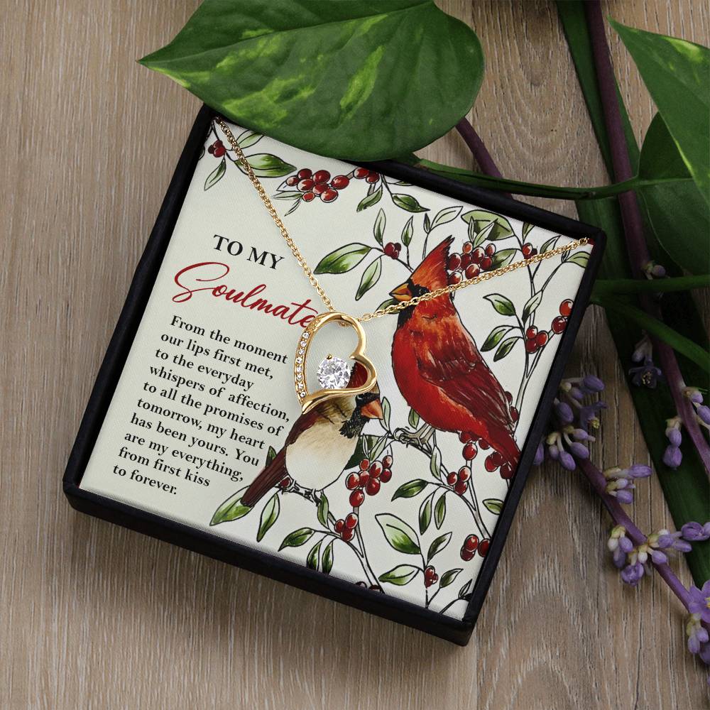 Gold finish necklace with a cubic zirconia crystal pendant on a decorative card featuring birds and berries, accompanied by a note titled "To My Soulmate," offered as the Soulmate-First Kiss - Forever Love Necklace.