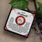 The Soulmate-Like A Dream - Forever Love Necklace features a gold heart design with cubic zirconia stones, a white gold finish, and includes a "To My Soulmate" card with a heartfelt message. It is elegantly packaged in an ornate box with green leaves and purple flowers.