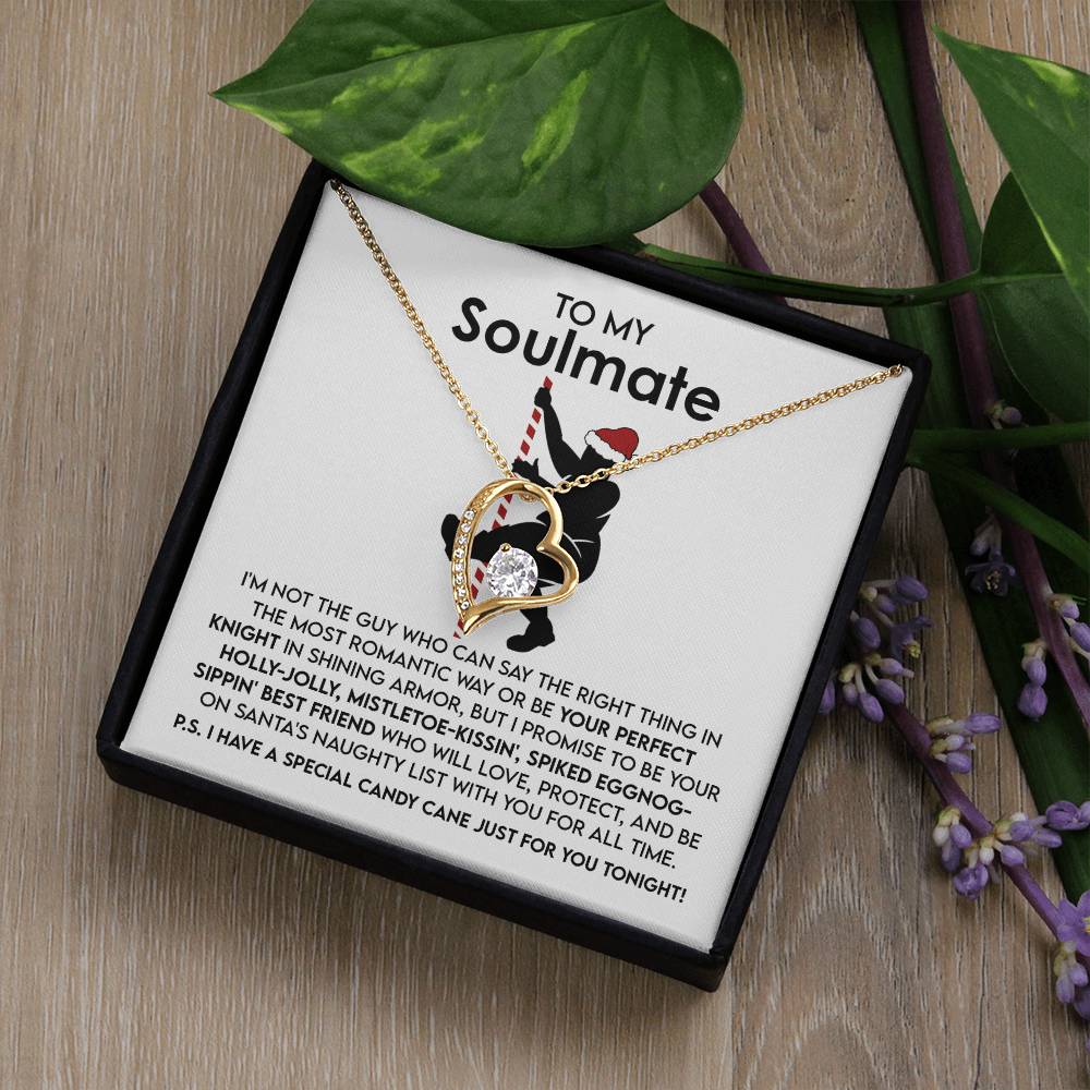 The Soulmate-For All Time - Forever Love Necklace features a heart-shaped pendant with a stunning cubic zirconia crystal and a luxurious gold finish. Presented in a gift box embellished with flowers and greenery, it conveys a heartfelt message to your soulmate.