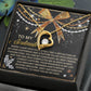 The Soulmate-By My Side Forever Love Necklace features a gold heart with a crystal center, elegantly presented in a gift box adorned with stars and a ribbon. It includes the heartfelt message "To My Soulmate," making it the perfect personalized gift.