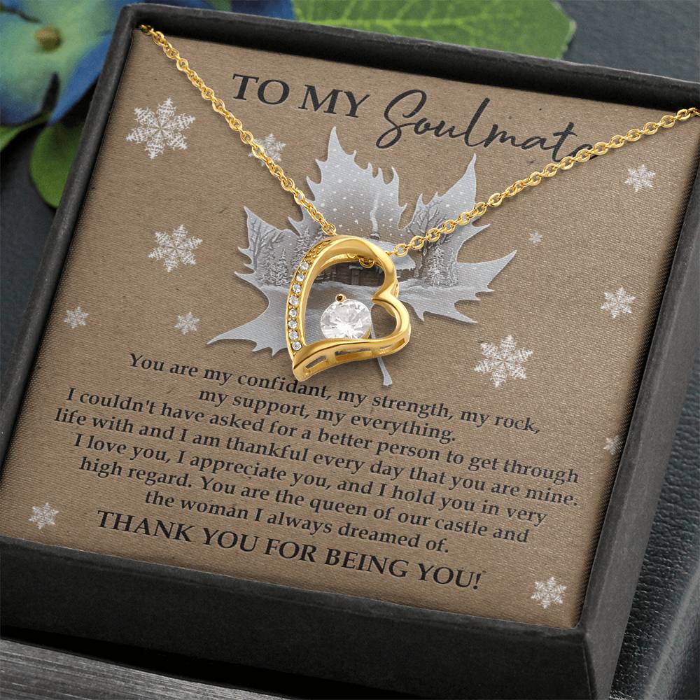 The Soulmate-Our Castle - Forever Love Necklace, featuring an exquisite gold heart-shaped pendant adorned with a sparkling CZ crystal, is beautifully presented in a box that includes a heartfelt message about love and appreciation printed inside.