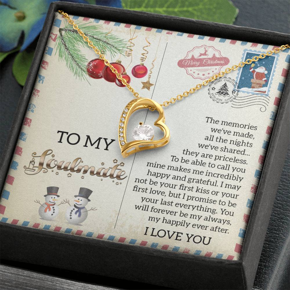 The Soulmate-Last Everything - Forever Love Necklace highlights a gold heart pendant embellished with a CZ crystal, gracefully displayed on a festive card featuring a romantic message. This captivating piece, coated with a white gold finish, comes packaged in an exquisite black box, ensuring it is the ideal gift of love.