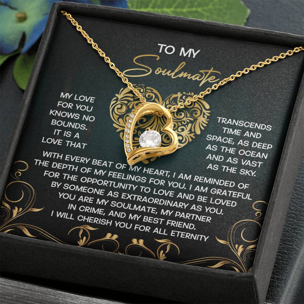 The Soulmate-The Sky Forever Love Necklace, a gold heart-shaped piece with a bright CZ crystal, is presented on a card titled "To My Soulmate" and features a heartfelt message about love and devotion.