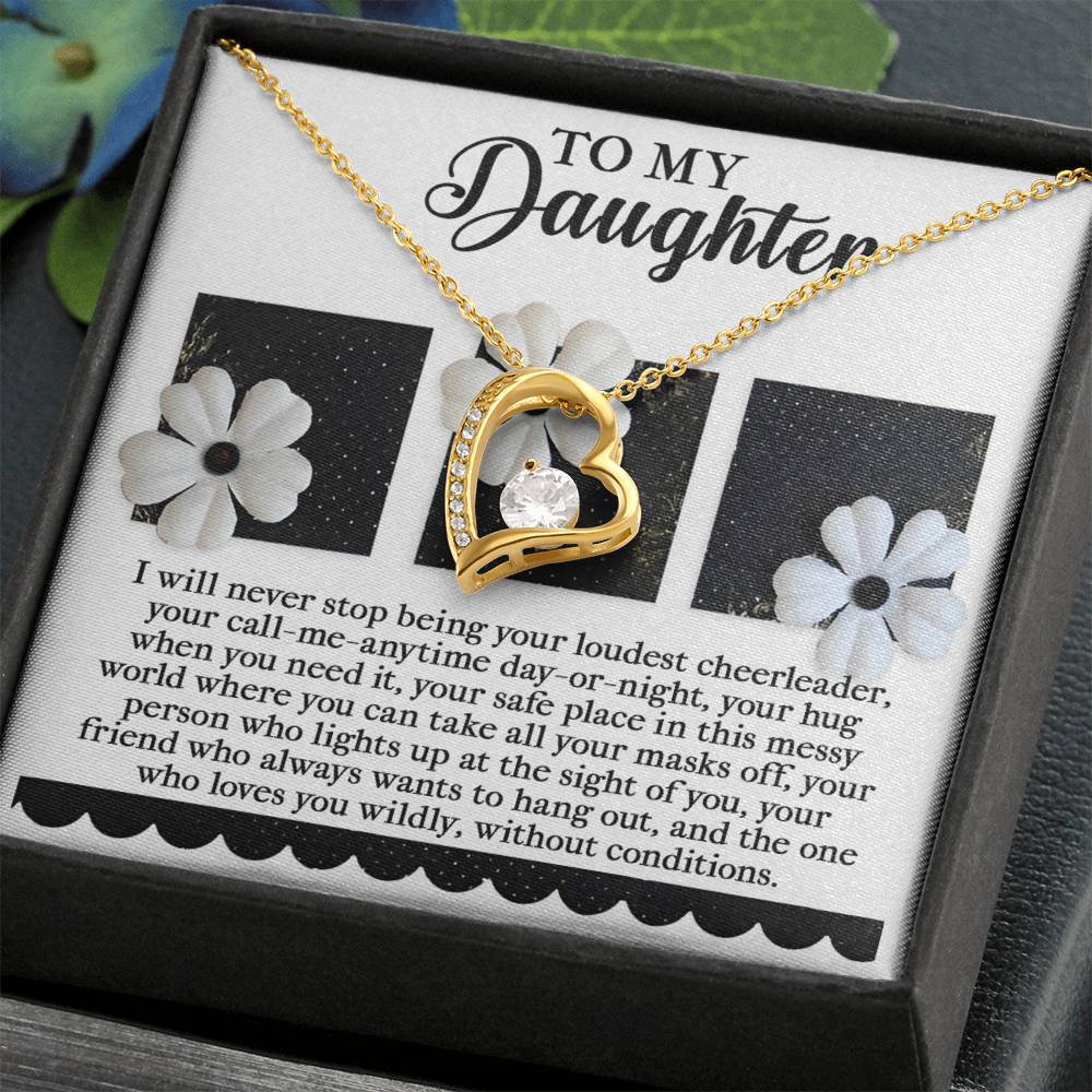 The Daughter-Loudest Cheerleader - Forever Love Necklace, featuring a heart-shaped gold design with a CZ crystal, displayed on a card with a sentimental message to a daughter, epitomizes timeless elegance.