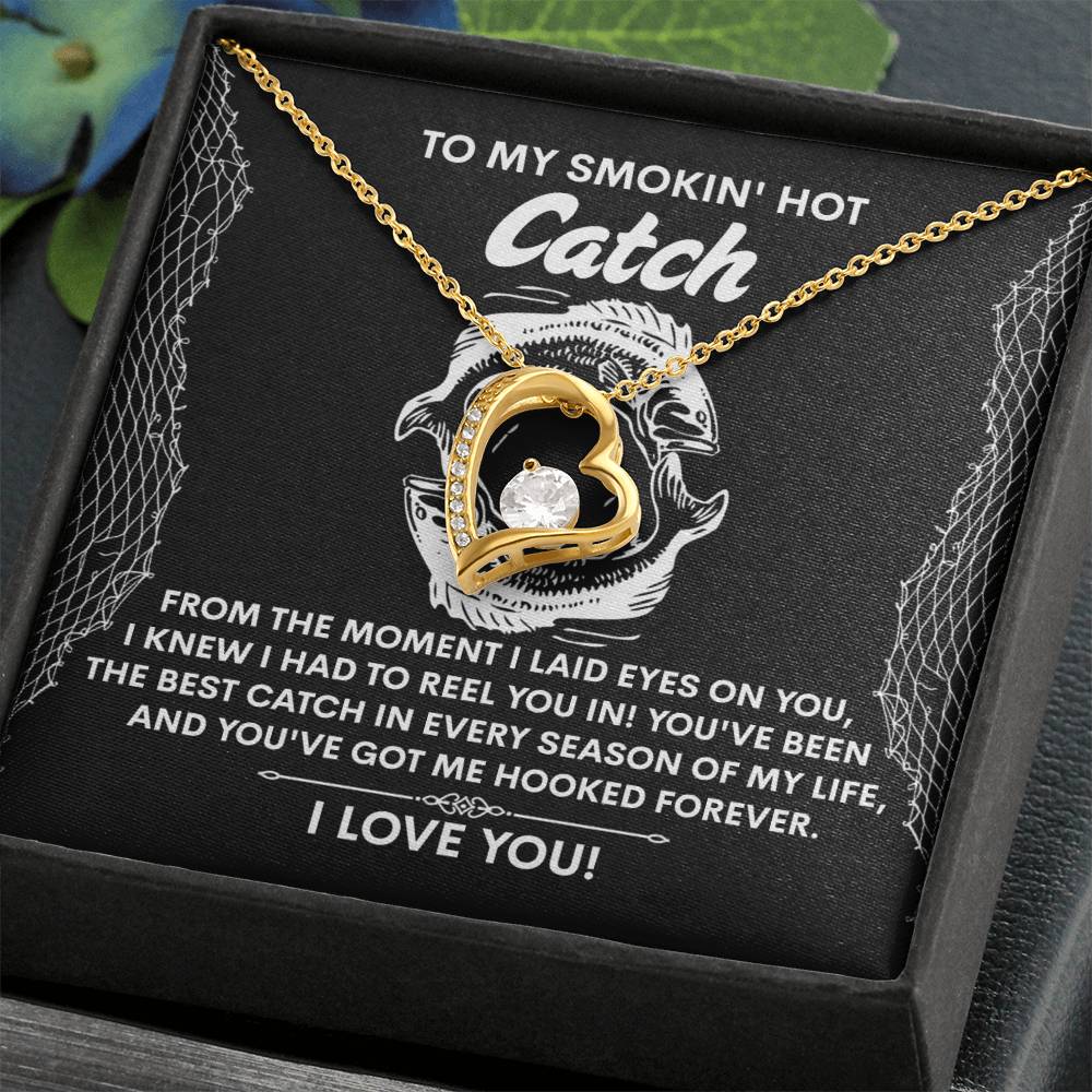 The Soulmate-Got Me Hooked - Forever Love Necklace includes a heart-shaped pendant with a CZ crystal, nestled in a black box. Inside is a romantic note with a sweet fish illustration.