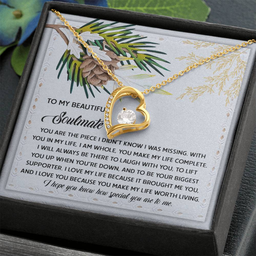 The Soulmate-Biggest Supporter - Forever Love Necklace showcases a heart-shaped pendant adorned with a sparkling diamond, beautifully presented in a box. Enhanced with a gold finish, it comes with an affectionate message for your soulmate.