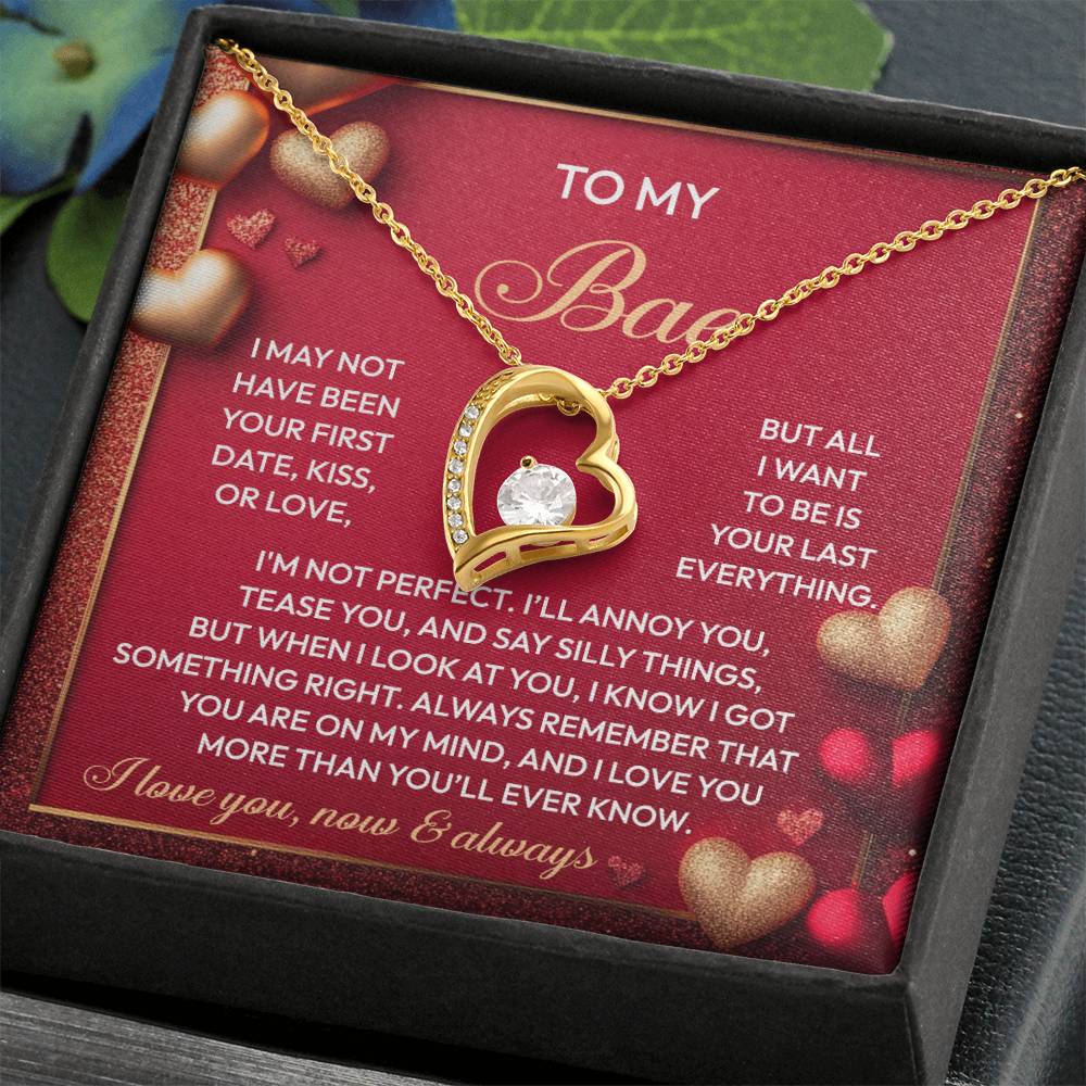 The Soulmate-On My Mind - Forever Love Necklace has a gold heart-shaped pendant with a sparkling CZ crystal, presented in a black box with a romantic card titled "To My Babe" and decorated with heart graphics.