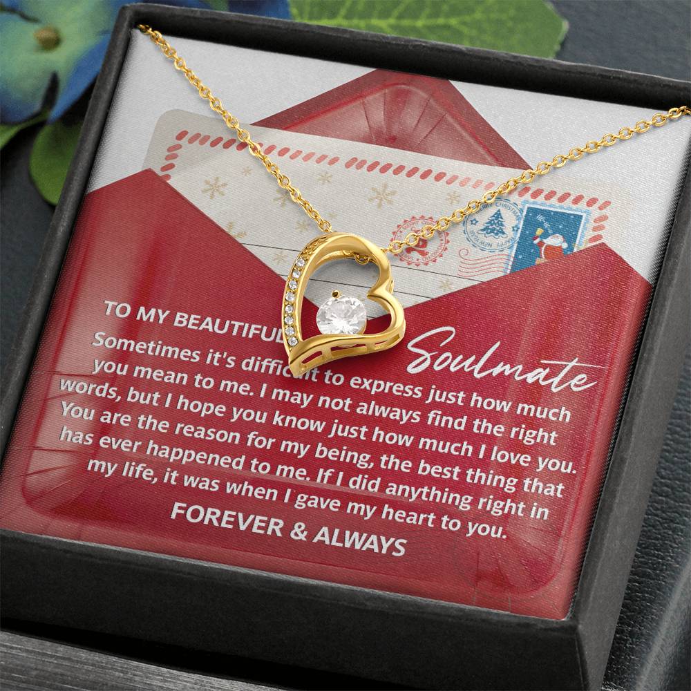 The Soulmate-Right Words - Forever Love Necklace includes a heart-shaped pendant with a gold finish and is adorned with a sparkling CZ crystal. It comes presented on a card featuring a heartfelt message and is elegantly packaged in a box.