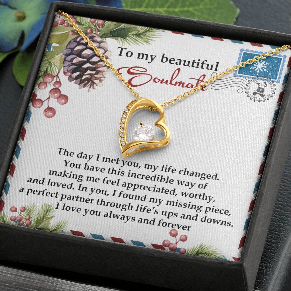 The Soulmate-Perfect Partner - Forever Love Necklace showcases a gold heart pendant adorned with shimmering cubic zirconia, beautifully displayed on a holiday-themed card complete with a sentimental message.