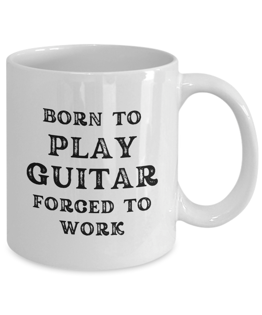 Born to Play Guitar Forced to Work Coffee Mug: White with black text. Best gift idea and appreciation cup for guitarists. Printed and shipped from the USA for a limited time.