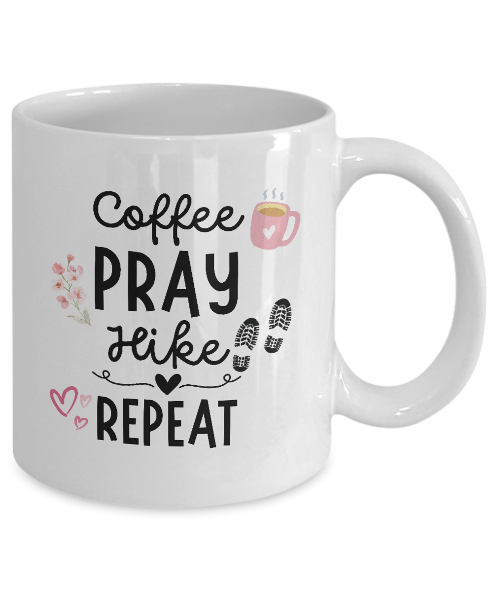 The "Coffee Pray Hike Repeat" mug, featuring graphics of a coffee cup, flowers, and footprints, is printed and shipped from the USA for a limited time. It's an ideal gift for hikers.