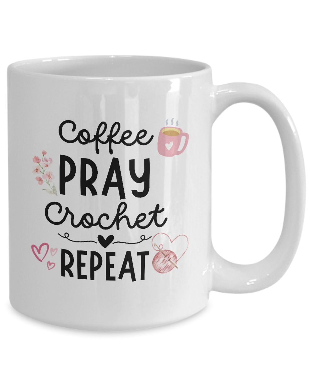 The "Coffee Pray Crochet Repeat" white mug, adorned with coffee cup and heart illustrations, is a special edition not available in stores. Perfect for crocheters seeking unique gift ideas.