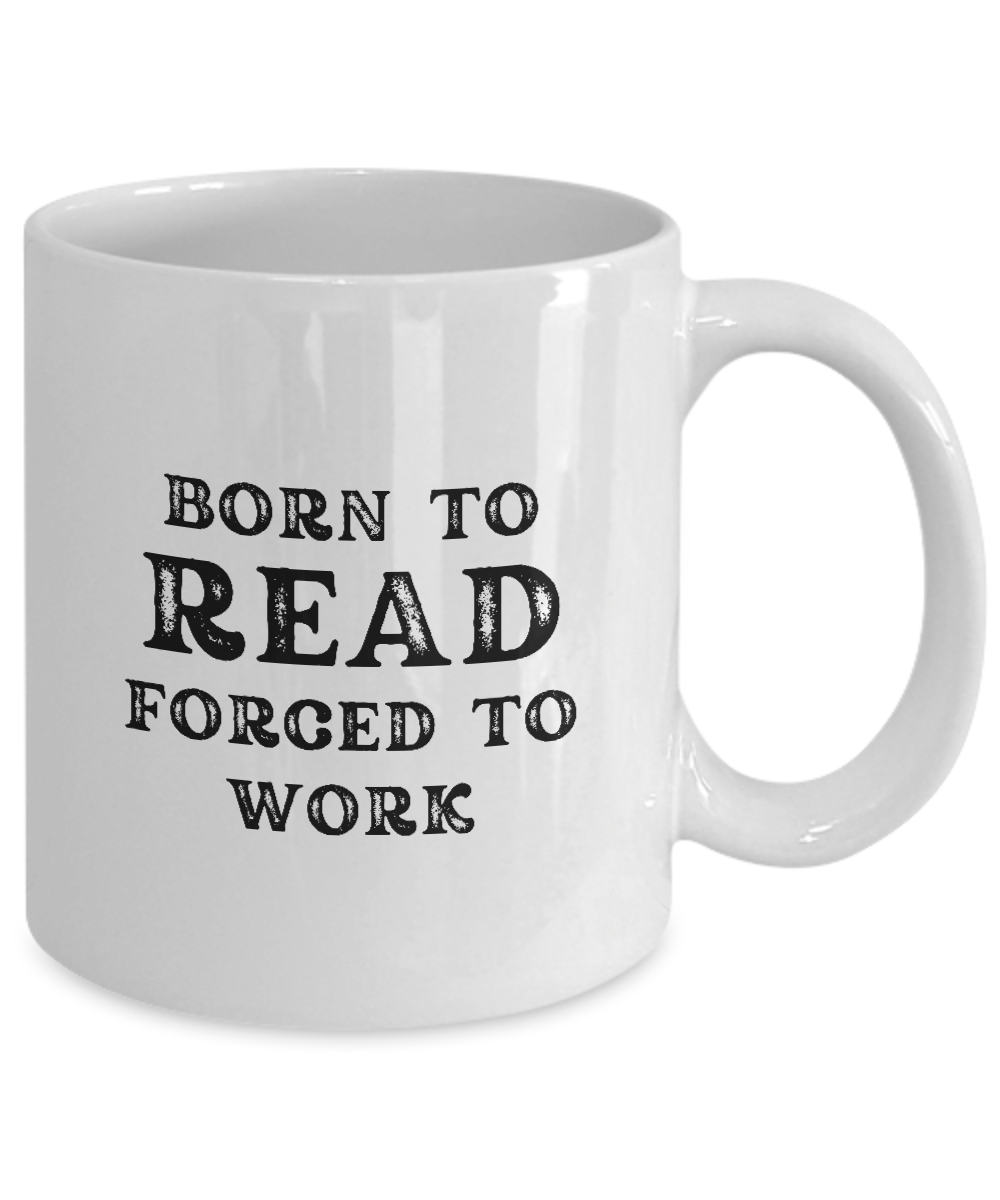 This white mug displays "Born to Read, Forced to Work" in playful black text. It offers a unique online-only find with limited availability and guaranteed safe checkout.