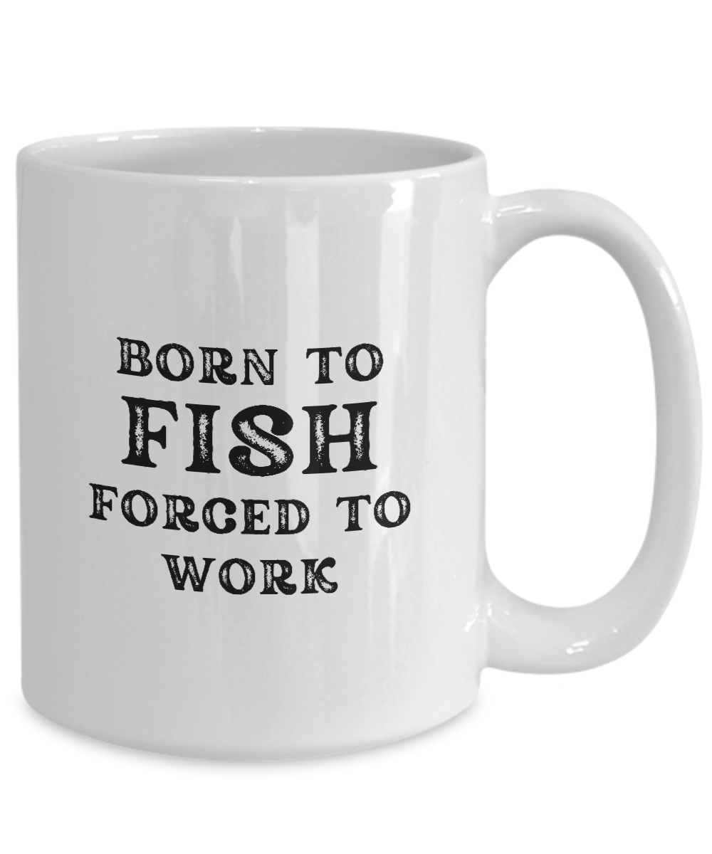 This coffee mug, titled "Born to Fish Forced to Work," is a unique gift for anglers or fishermen, featuring bold black text and produced and shipped from the USA.