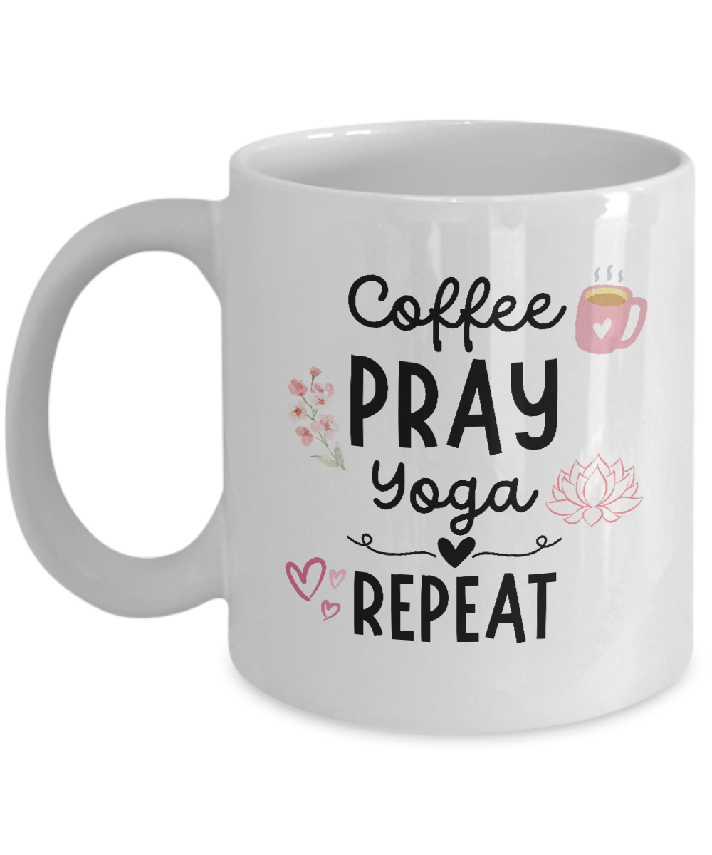 Introducing the Coffee Pray Yoga Repeat Coffee Mug, featuring the text "Coffee, Pray, Yoga, Repeat" in elegant black letters and adorned with small pink icons of a coffee cup, flowers, hearts, and a lotus flower. This unique mug is printed and shipped from the USA and is available for a limited time only—a perfect gift idea for any yogi!