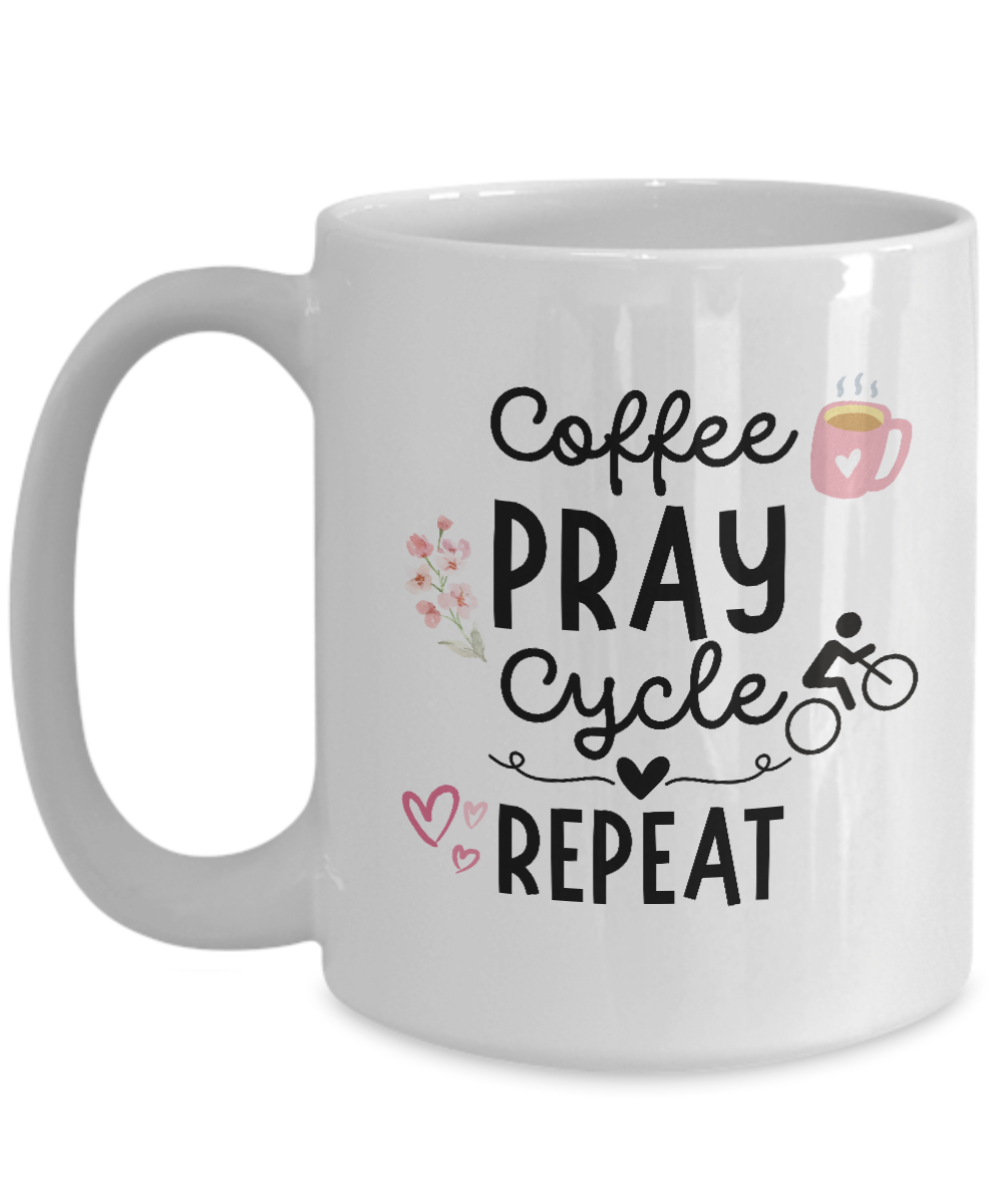 The "Coffee Pray Cycle Repeat" mug features black text and delightful illustrations of a coffee cup, hearts, flowers, and a cyclist. This exclusive design isn't available in stores and is offered for a limited time. Order the Coffee Pray Cycle Repeat Coffee Mug securely now!.