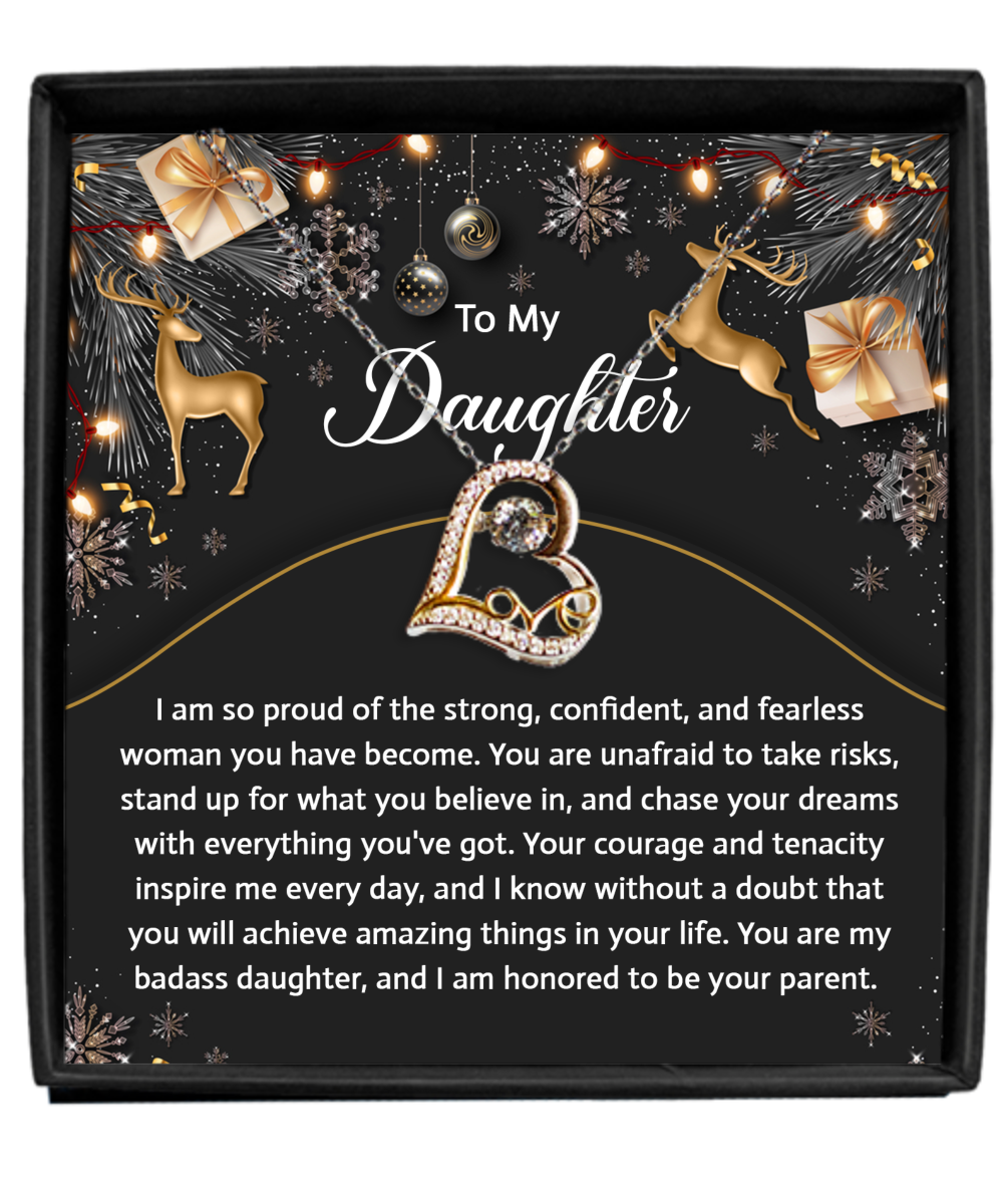 The Daughter-Amazing Things - Love Dancing Necklace comes in a black box adorned with gold deer and snowflake decorations. The sterling silver card contains an encouraging message from a parent to a daughter, applauding her bravery and wishing her success.