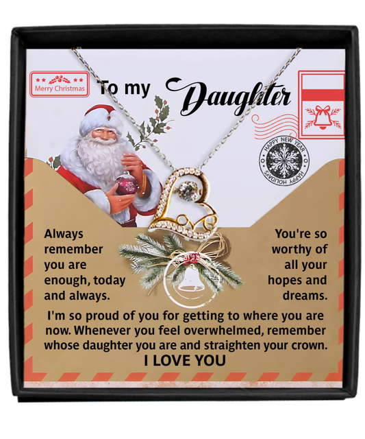 This Christmas-themed necklace gift box showcases a triple-plated design with a Santa illustration and a heartfelt message for your daughter, containing the Daughter-All Your Hopes - Love Dancing Necklace, perfectly capturing the spirit of the season.