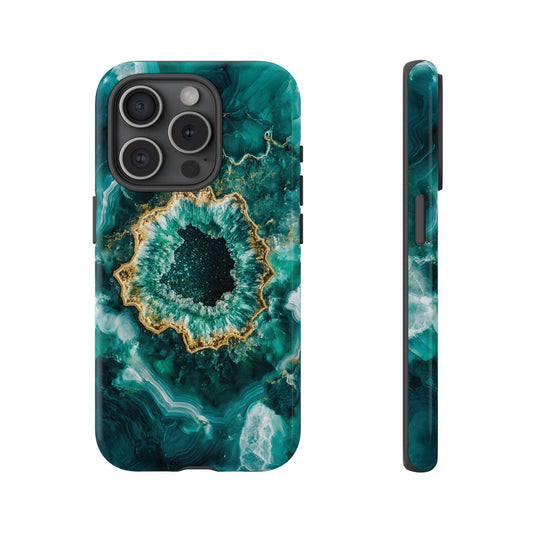 Front view and side view of an iphone 15 Pro May Birthstone Emerald Crystal Geode Design Phone Case featuring a polished emerald mineral cross-section, showcasing deep green crystalline structures surrounded by layers of teal and white.