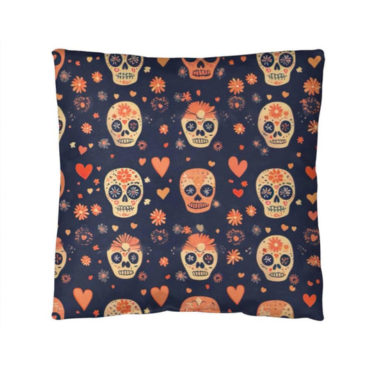 Front view of a Day of the Dead Mexican Skull Pillow.  Adorned with colorful designs of flowers, hearts, and geometric patterns against its dark blue background, creating an eye-catching addition to your Halloween decor.