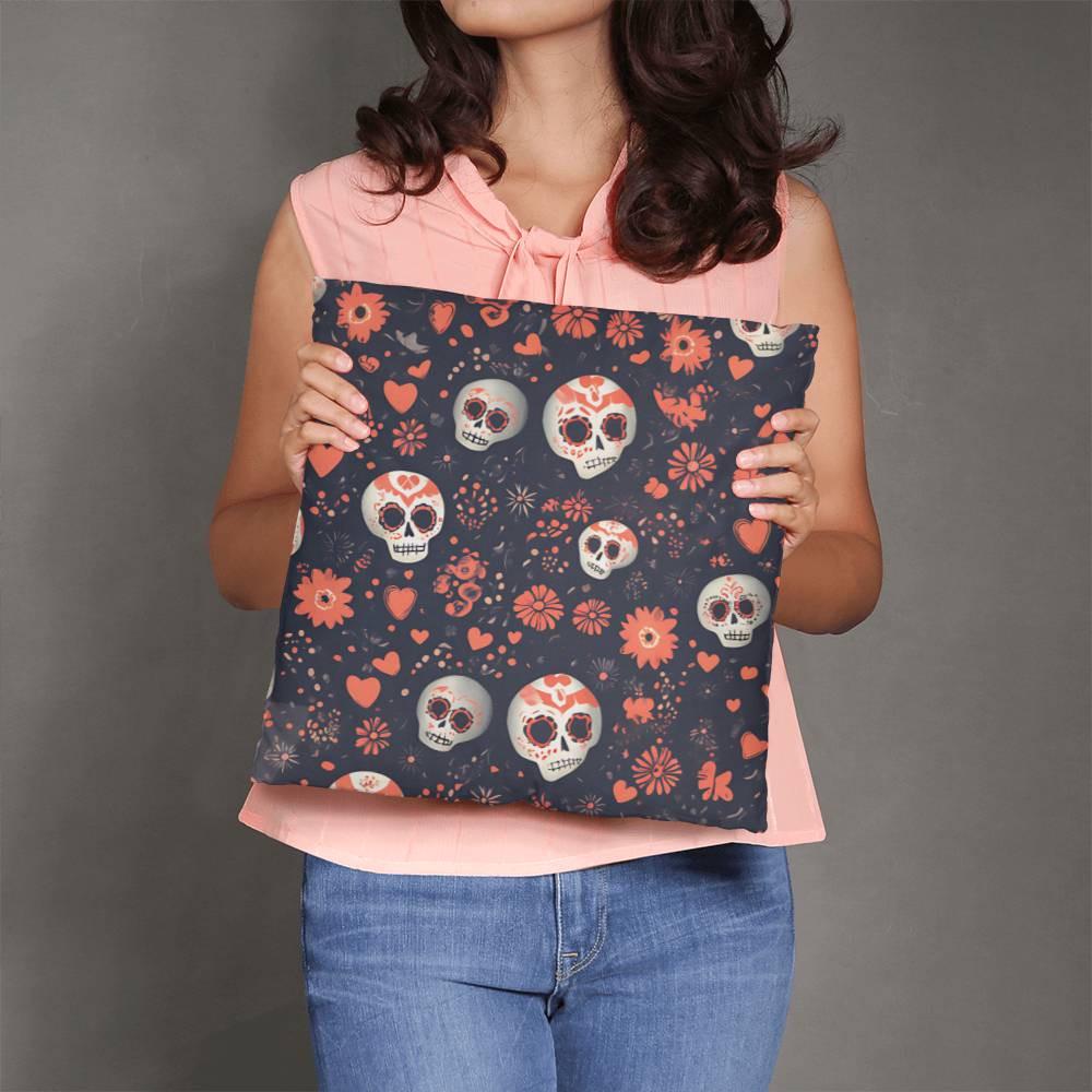 A person holds the Day of the Dead Mexican Skull Pillow, featuring a vibrant sugar skull design and floral patterns, ideal for adding a touch of goth home decor to any space.