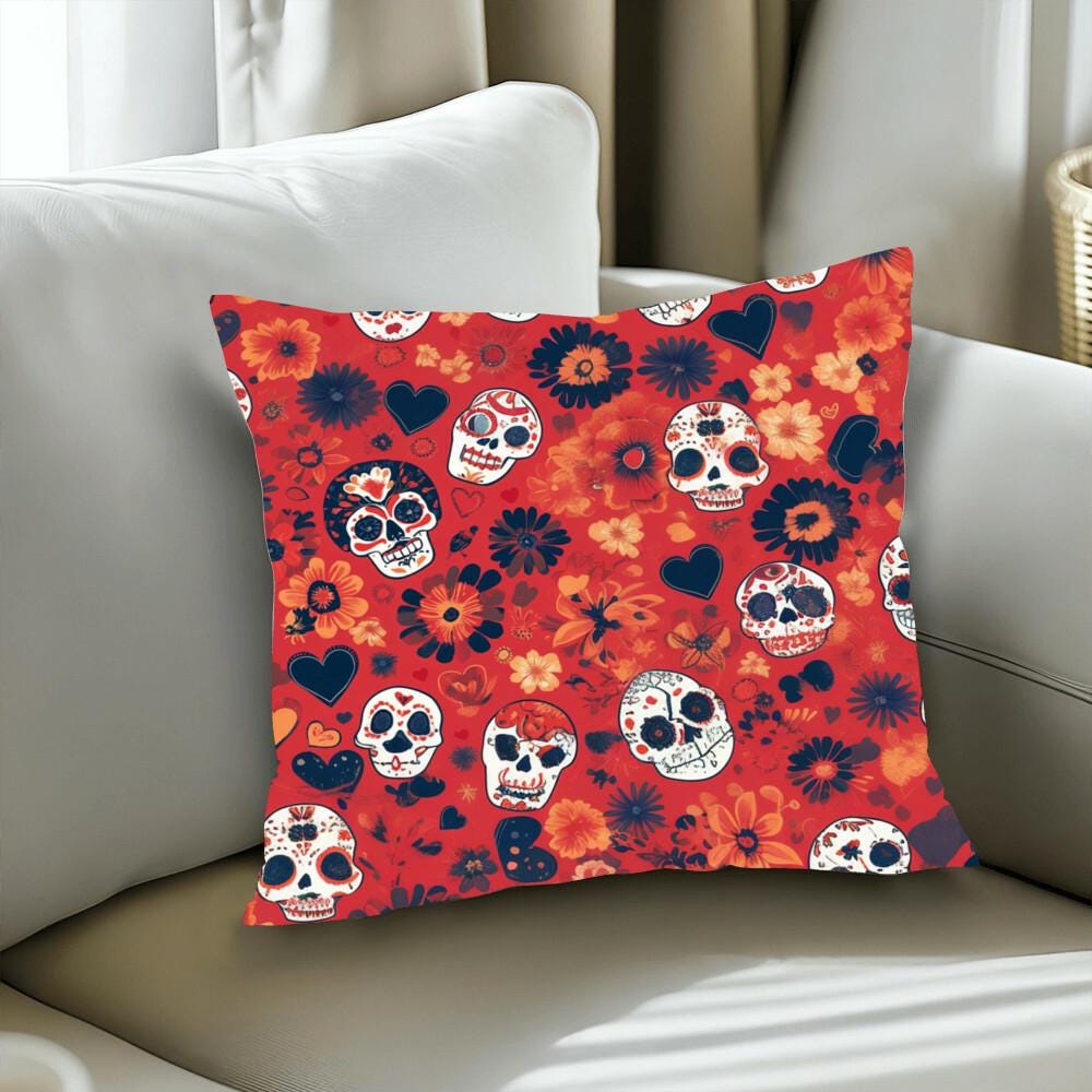 The Day of the Dead Mexican Skull Pillow, with its vibrant skull and flower pattern on a red background, offers a gothic touch to your white sofa, making it a perfect spooky decorative pillow for any skull lover.