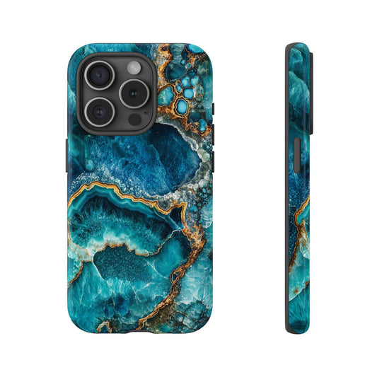 Front view and side view of an iphone 15 Pro December Birthstone Turquoise Crystal Geode Design Phone Case featuring the intricate patterns of rich blue and teal hues evoke the enchanting allure of geological formations.