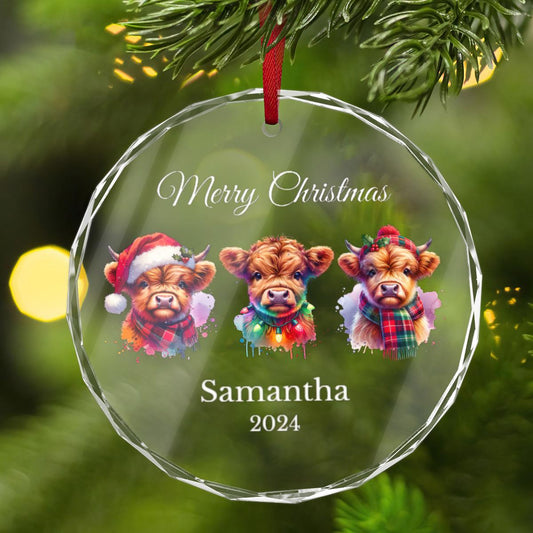 Golden Value SG&#39;s Personalized Highland Cow Glass Ornament showcases three illustrated highland cows dressed in festive attire, with the text &quot;Merry Christmas&quot; and Custom name &quot;Samantha&quot; 2024 hanging elegantly from a branch.