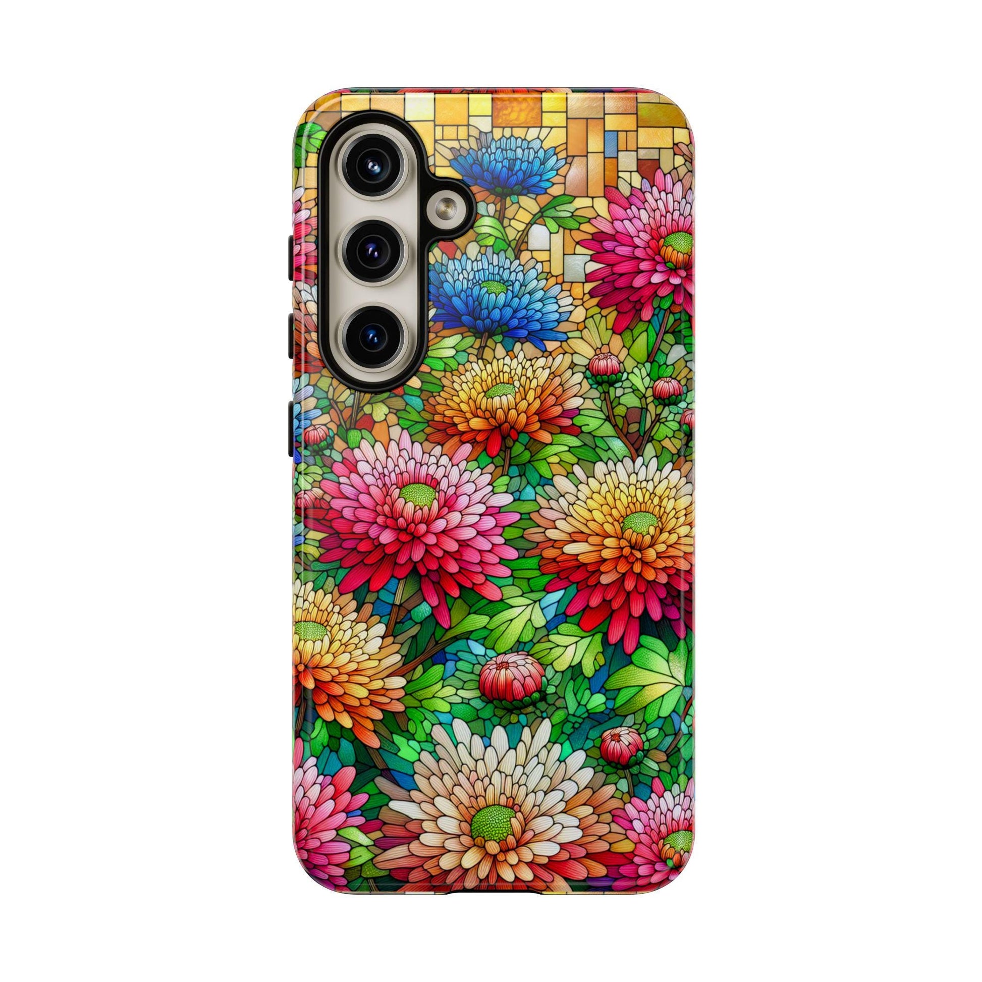 An iPhone or Samsung adorned with a November Birth Flower Chrysanthemum Phone Case features faux stained glass floral patterns that beautifully complement the triple-lens camera. Perfect as a birthday or Christmas gift.