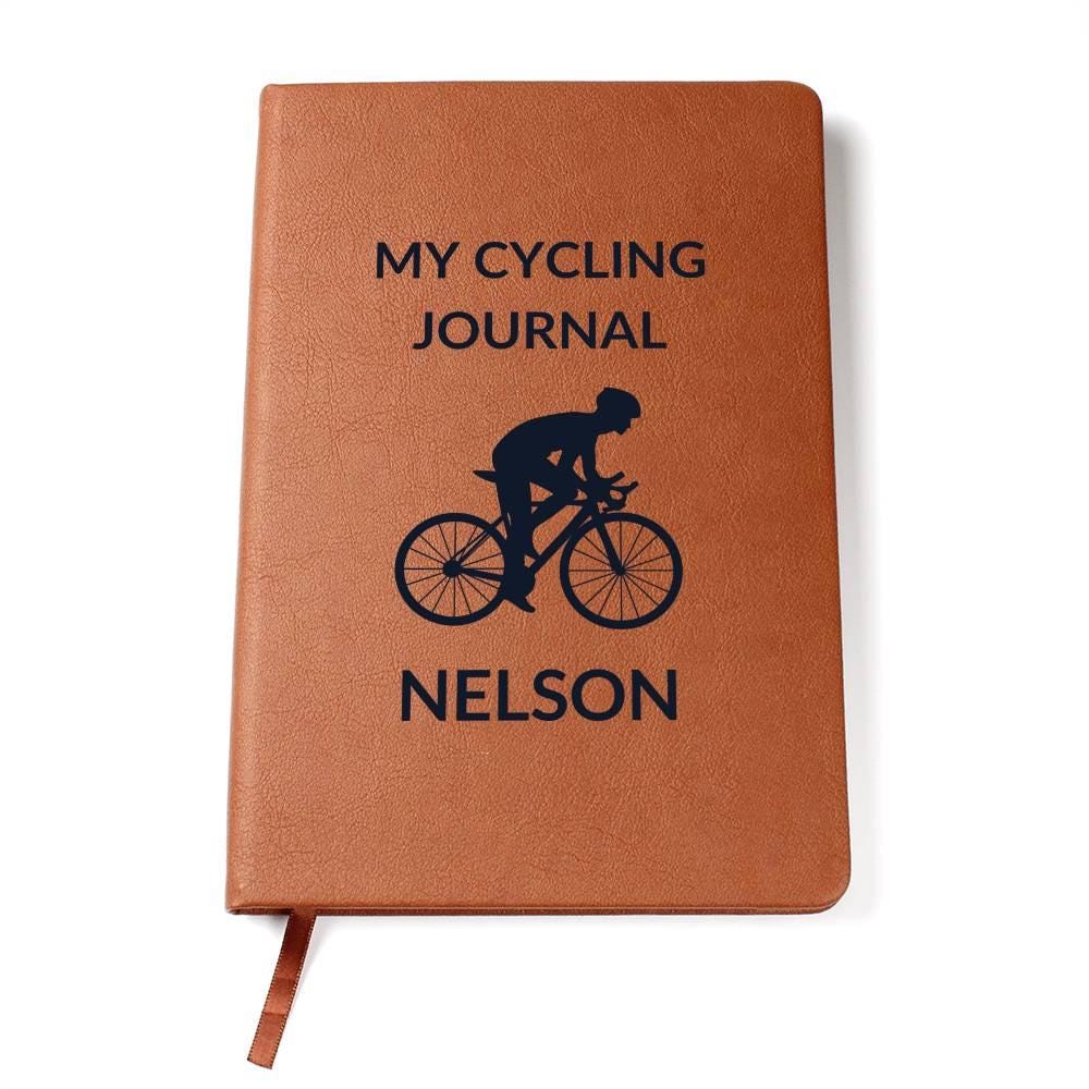Golden Value SG's Personalized Leather Cycling Journal For Men features a brown leather cover titled "My Cycling Journal" with a cyclist silhouette and the name "Nelson" printed below.