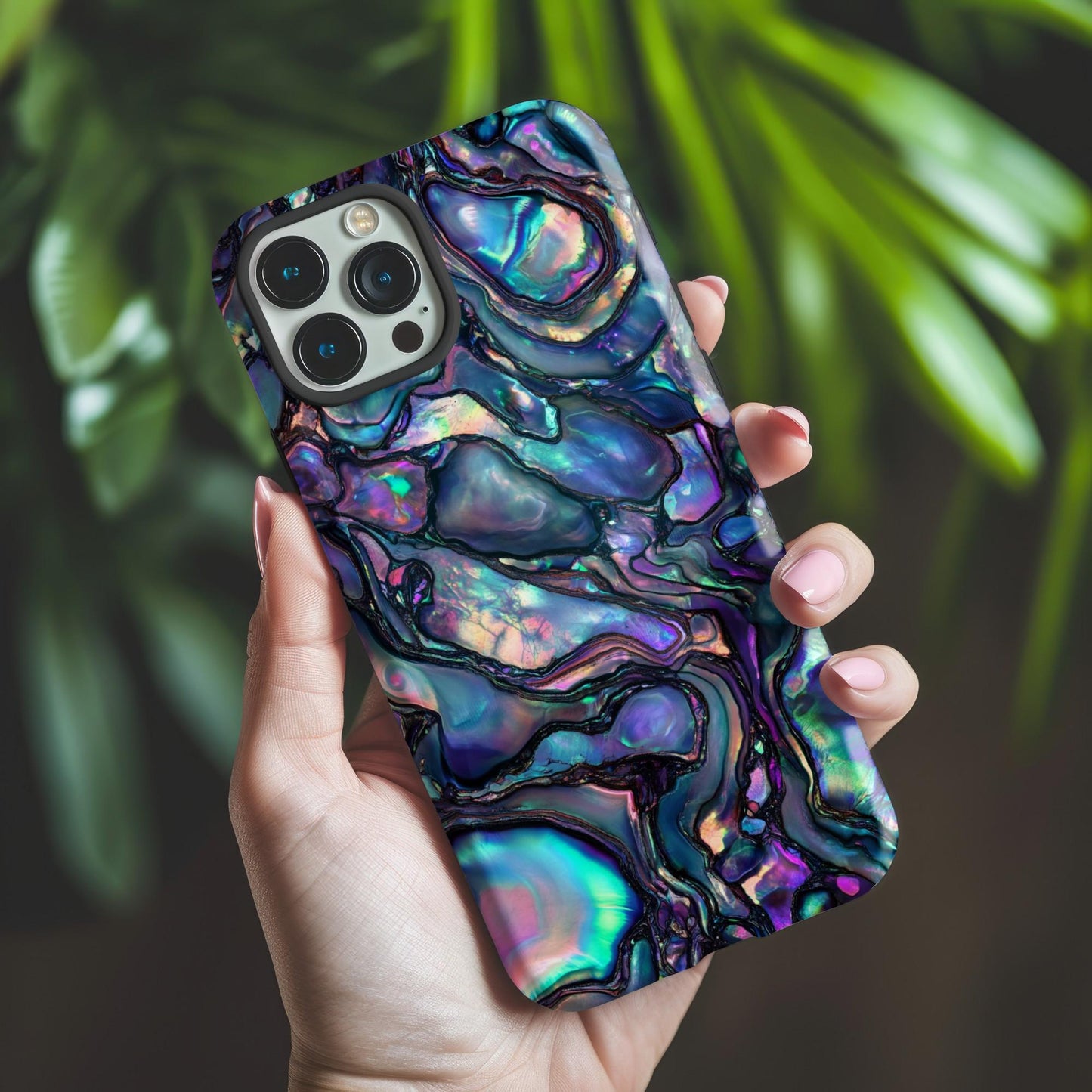 Abalone Phone Case by Golden Value SG featuring vibrant abstract pattern like abalone shell or polished opal. Features flowing organic shapes with blues, purples, and greens, creating a shimmering, lustrous effect.