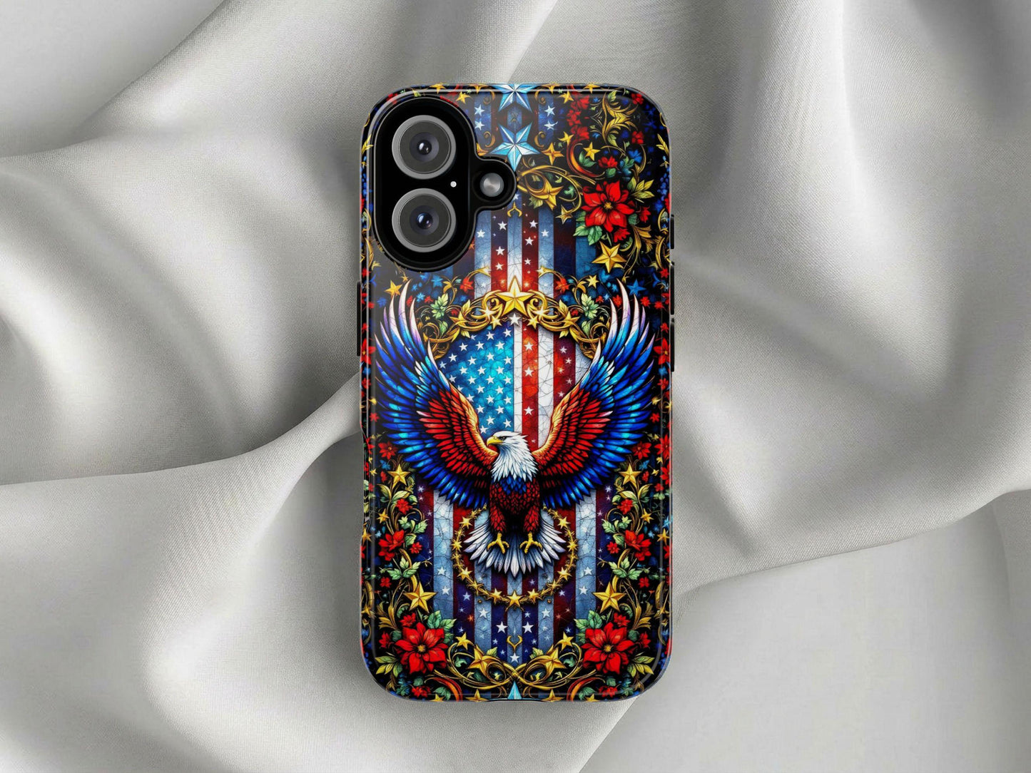 The Golden Value SG American Flag and Eagle Phone Case features a vibrant bald eagle with spread wings over a U.S. flag shield, gold scrollwork, red flowers, green leaves, and stars on a smooth white silk background.