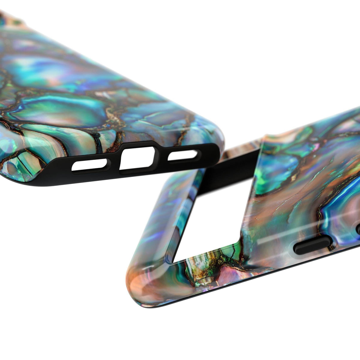 Close-up of the bottom and corner cutouts of two phone cases showcasing the abalone print and black protective bumper.