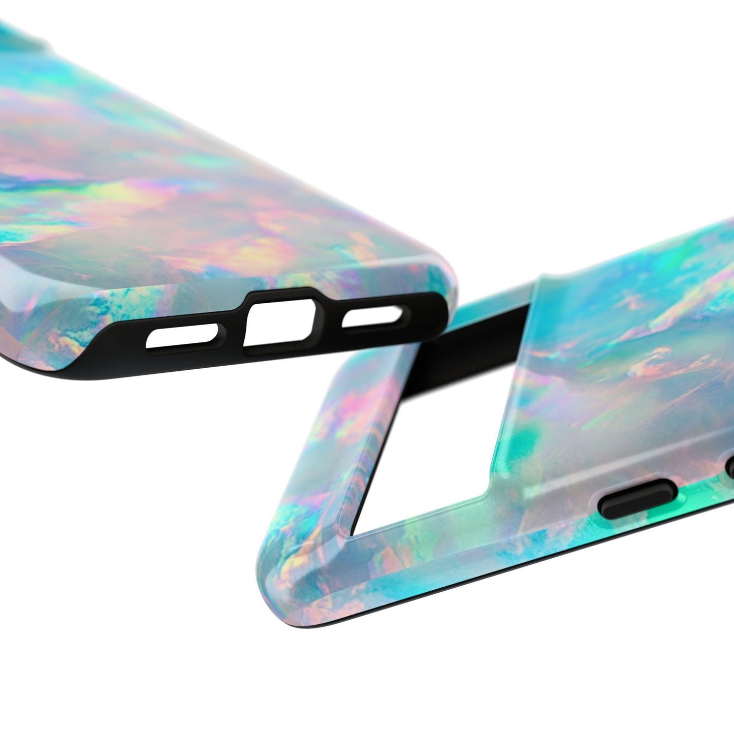 An angled view of two pastel opal phone cases showing their glossy textured backs and port cutouts.