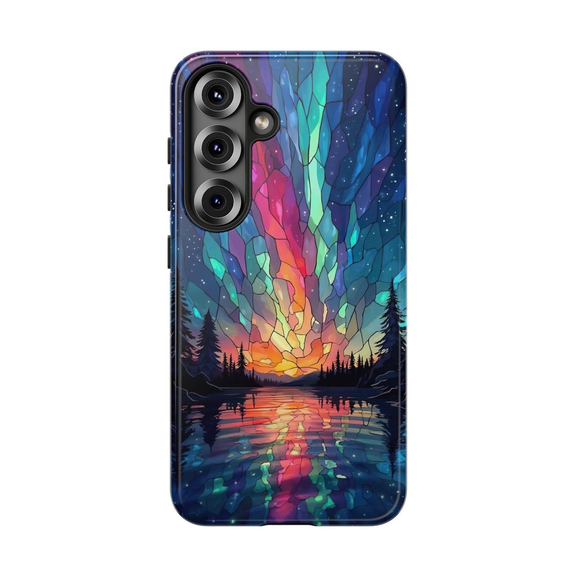 A phone case featuring a faux stained glass design of the northern lights over a lake with silhouetted trees, shown with a vertical triple-camera cutout.