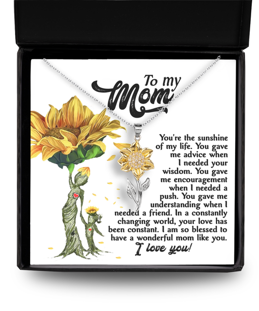 To Mom, The Sunshine - Sunflower Pendant Necklace in a box with a message for mom, featuring floral design elements, and an appreciative note.