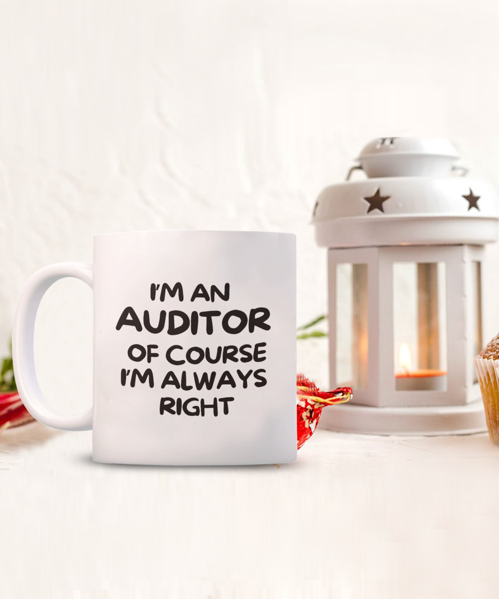 The "I'm An Auditor Of Course Iâ€™m Always Right" coffee mug, featuring text beside a lantern with a lit candle, is a unique, limited-time gift not available in stores. Proudly crafted in the USA, this statement piece makes an excellent conversation starter.