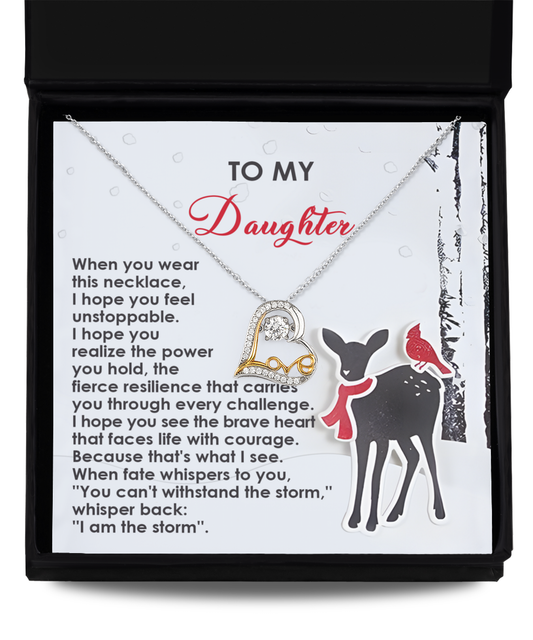 The Daughter-Every Challenge - Love Dancing Necklace features a heart pendant and is elegantly displayed on a card inscribed with "To My Daughter" above an illustration of a deer and a bird. Made from sterling silver, the card carries an encouraging message.