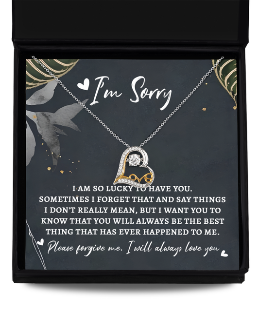 A sterling silver heart-shaped necklace named "Sorry-The Best Thing - Love Dancing Necklace" with a note saying "I'm Sorry" and an apology message inside a box.